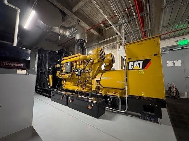 Caterpillar generator installed in indoor mechanical room