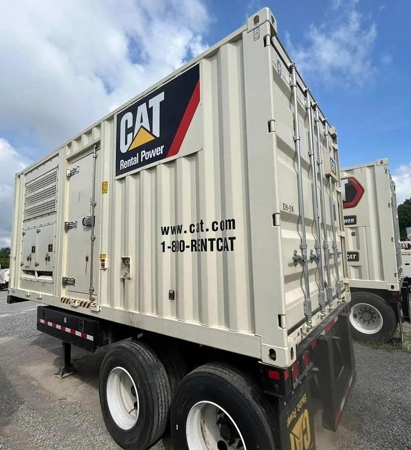 CAT Rental Power containerized generator secured on trailer